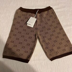 Brand new with tags Gucci kids shorts size 8 logo all over